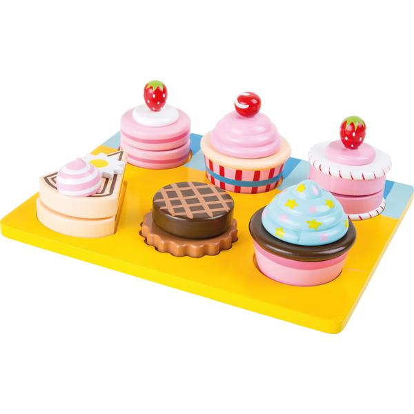 small foot  ® Skärning av cupcakes och kakor