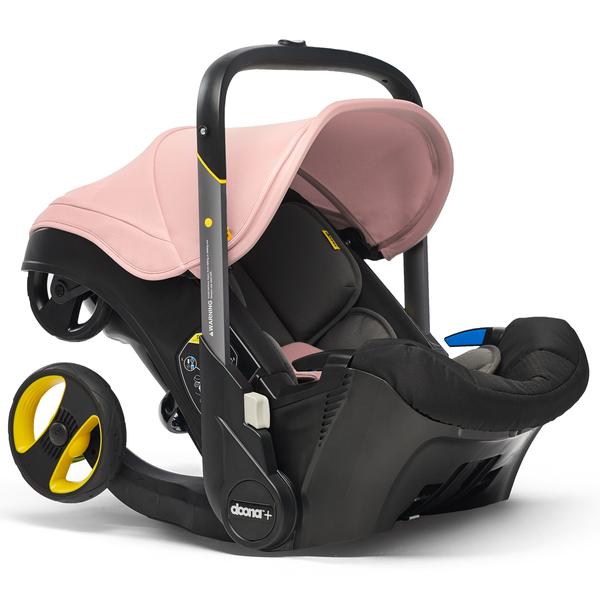 DOONA Babyautostol Blush Pink / lyserød med integreret barnevognsstel, 2 i 1